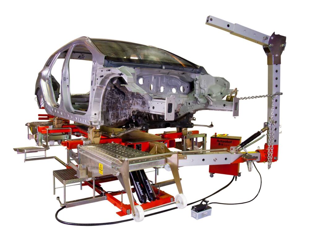 Frame straightening machine set up for demanding frame repairs